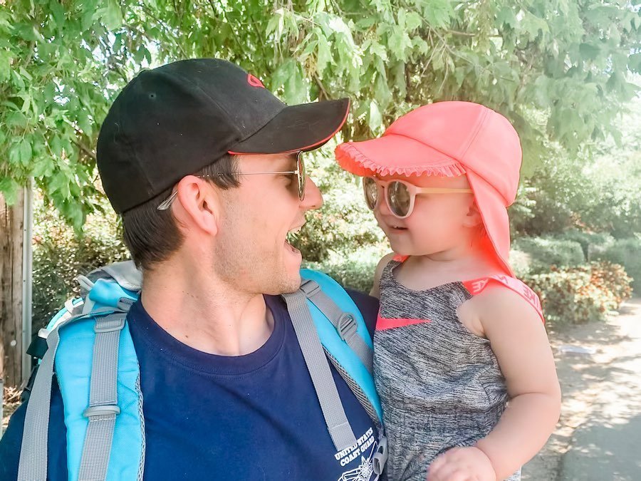 Maria Alice outdoors with her father